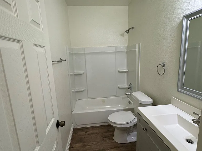 Secondary bathroom in between of the 2 extra rooms.