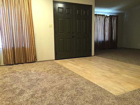 open floor-plan: foyer, living and dining rooms. Recessed LED lighting throughout house.