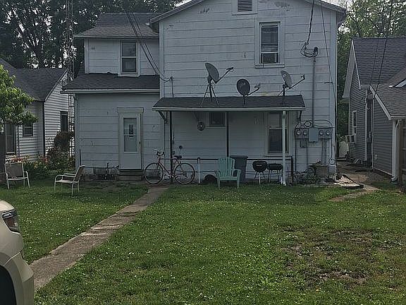 from the alley in the rear