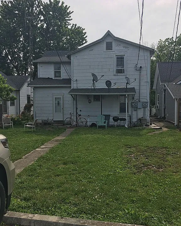 from the alley in the rear
