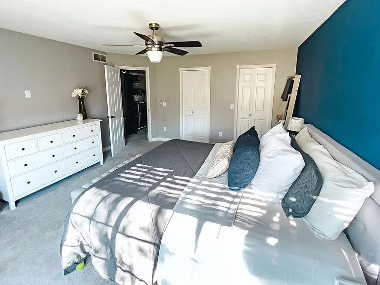 Primary bedroom. Room for king size bed, end tables, dresser, vanity - all of your furniture needs!