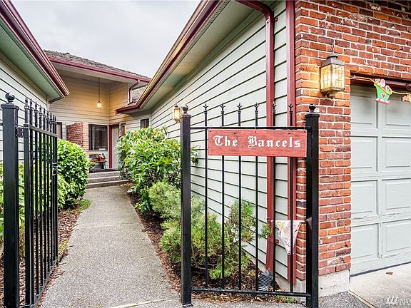 Entrance to Unit A is through the gate and to the right. 