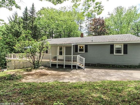 Expansive wrap around deck. Roomy driveway