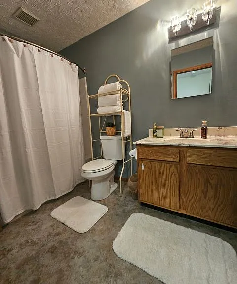 2nd floor full bath, tub/shower, sink/vanity, commode, medicine cabinet, lighting.