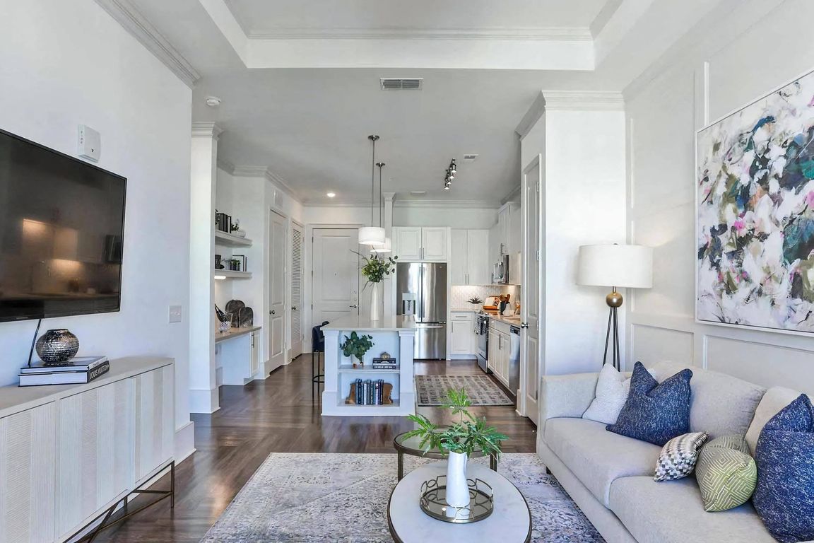 Open Floor Plan with Access from Living Room to Kitchen and Entry