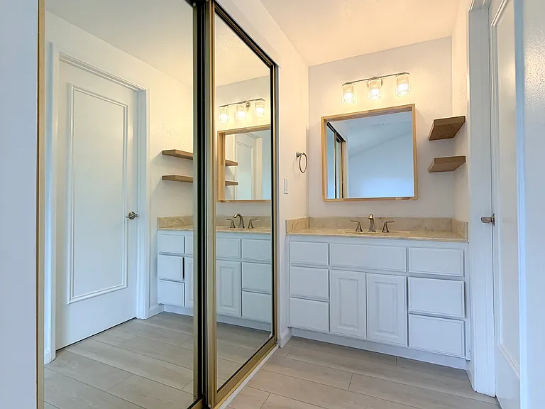 Newly renovated (2026) Master bedroom vanity area
Closet (Left, behind mirror sliding door)