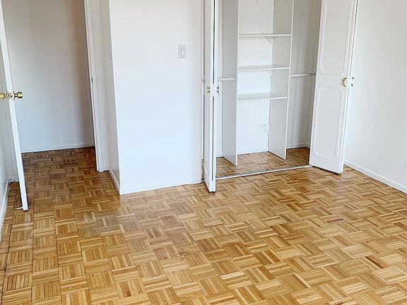 Bedroom with built-ins in closet
