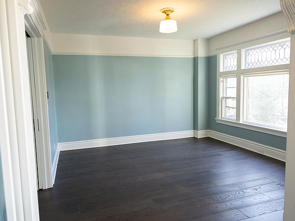Living room (13 ft x 13 ft) from the view of the entryway
