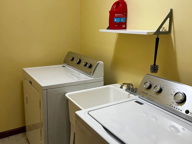 Separate laundry room on main floor next to garage
