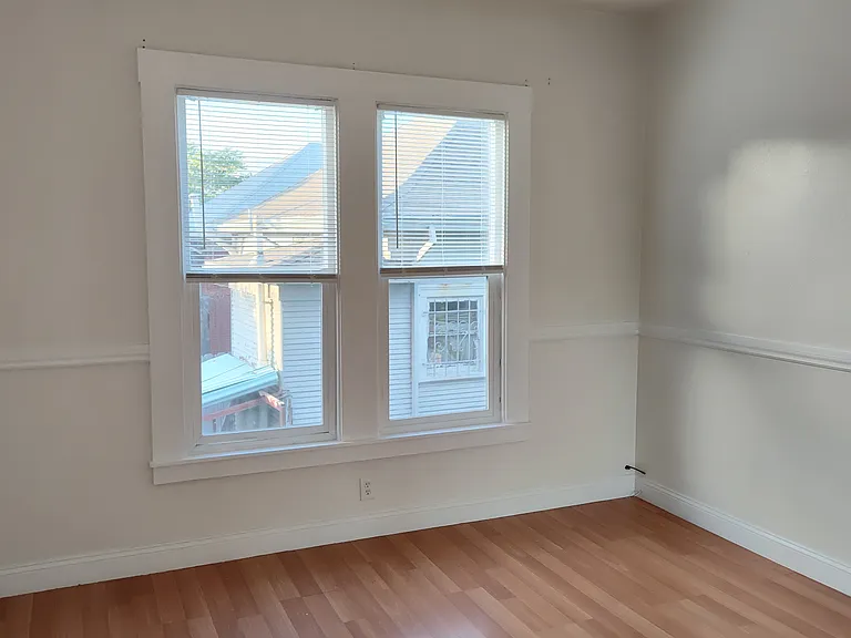 standing in back bedroom doorway