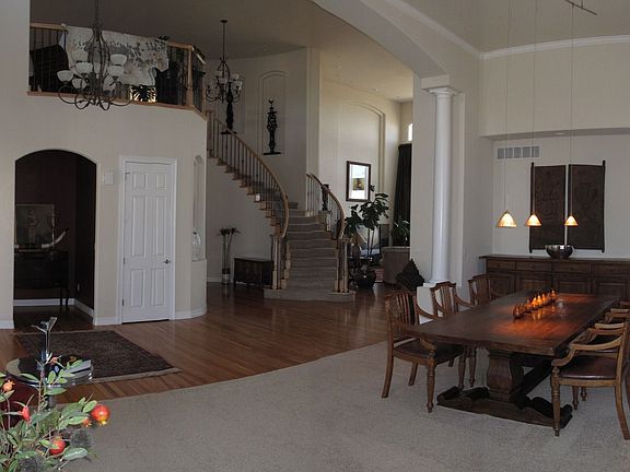 Dining Room and Curved Staircase