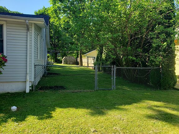 Side yard, fenced side and rear yard