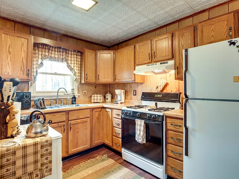 Kitchen view at Ian's Place Watersmeet Mi Vacation Rental. Lake front property rental Upper Peninsula #VacationRental