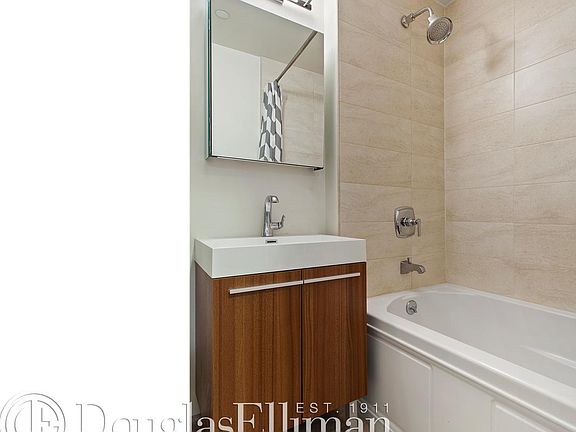 5th image of 306 E 82nd St APT 2A