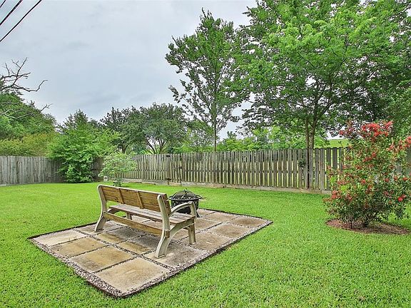 Before you tour the home, take a peek of a slice of your fabulous back yard. Your property sits on a parcel of land that will remain undeveloped and offers a taste of country living with no back neighbors.