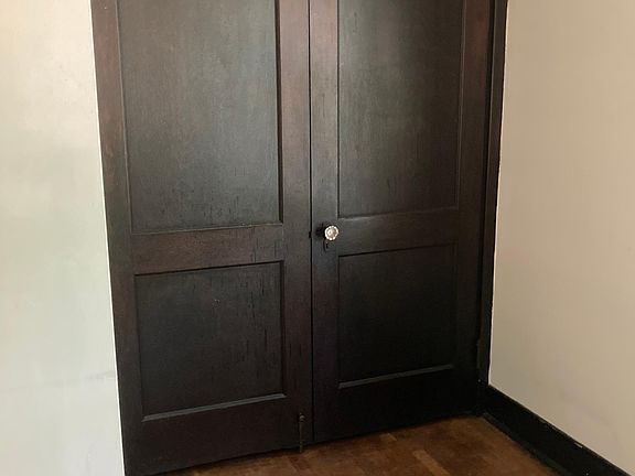 Murphy bed in living room (guest bed).