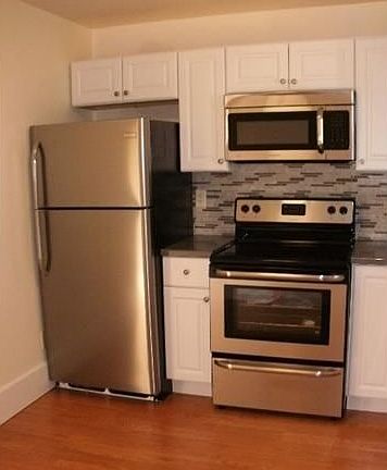 Corian Counters & Stainless Appliances