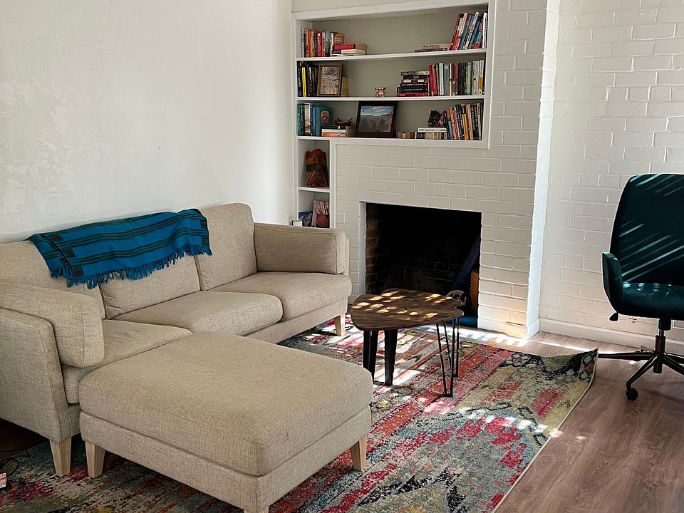 living area with tenants furniture.