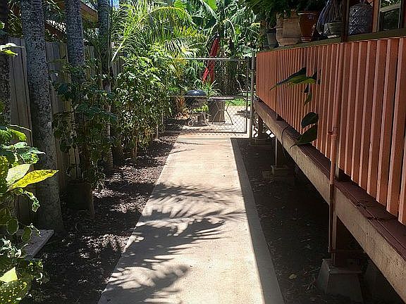 Left Sidewalk to Backyard