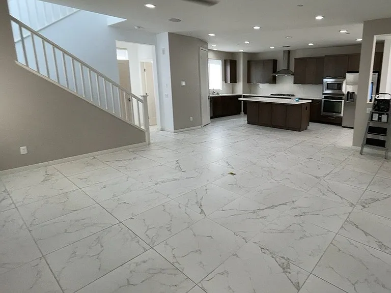 2nd floor - Great room - Kitchen, living room, under-stair storage, bathroom, balcony/patio