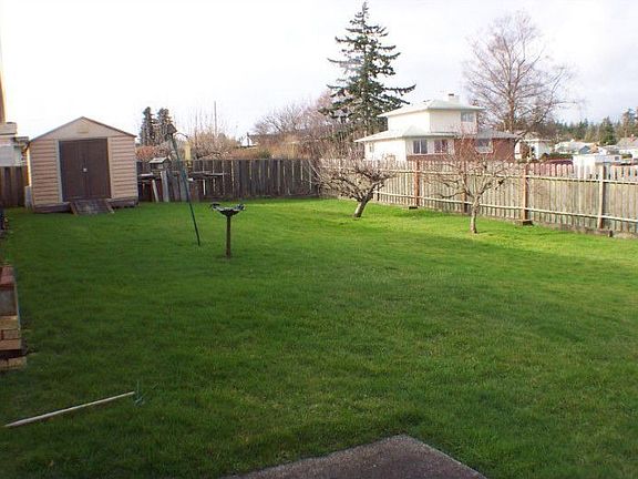 Huge lot offers lots of possibilities! No fuss yard equals easy care!