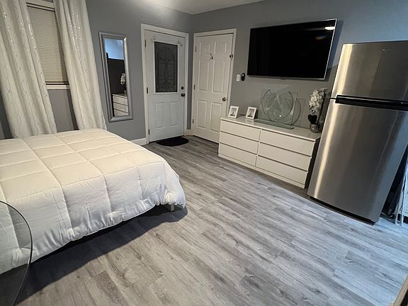 TV + Clothing Storage + Large Refrigerator included