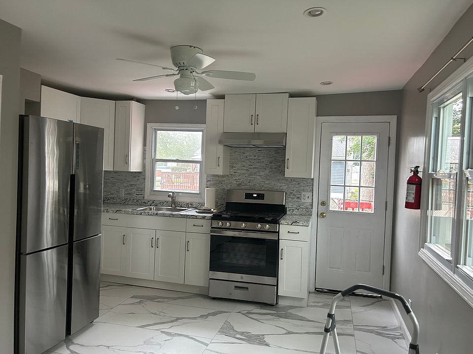 Kitchen and door leading out to the deck
