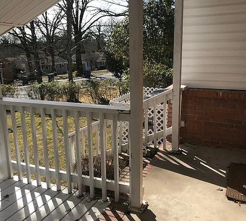 Covered front porch with sitting area