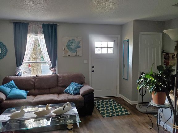 Living room with coat closet