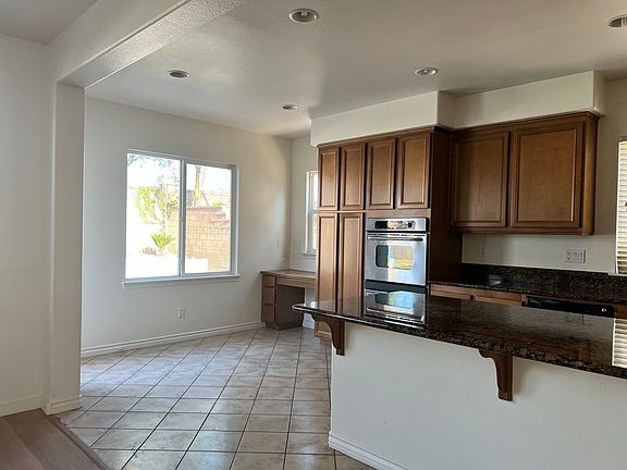 kitchen -breakfast nook and large island with double oven.