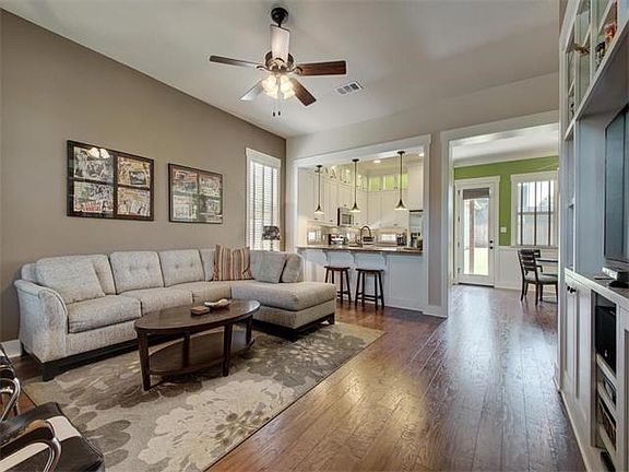 Living area is open to the kitchen and dining.