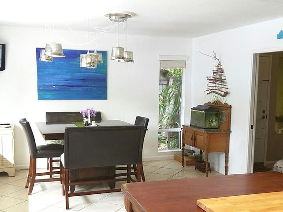 Dining area adjacent to open kitchen