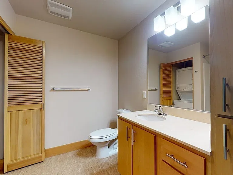 Apartment Bathroom with large soaking tub.