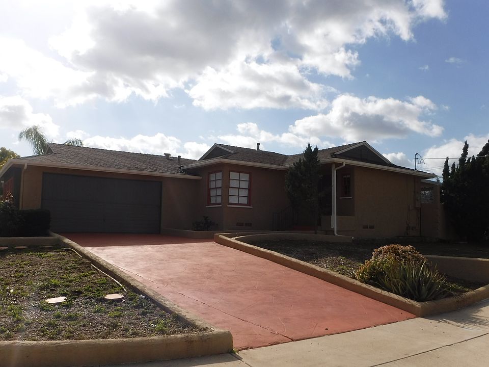 2 Car Garage and 2 Parking spaces