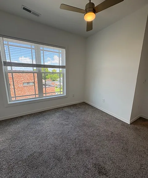 Bedroom 2 with attached full bathroom that also opens to the hall