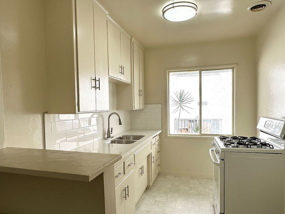 Kitchen with quartz counter top and gas stove