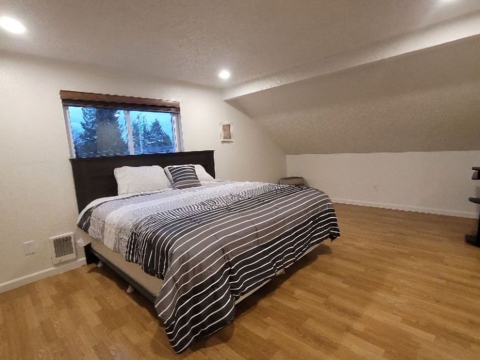 Master bedroom, king sized bed, small fabric drawer dresser