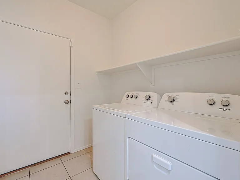 laundry with exit to garage