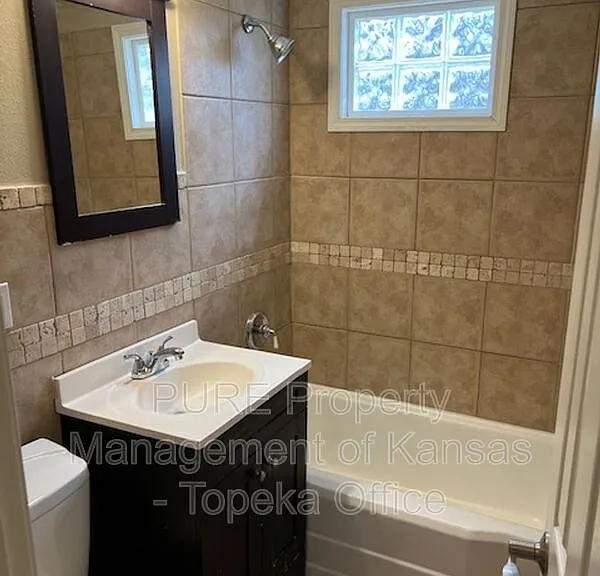 429 E 63rd Ter — Photo 16