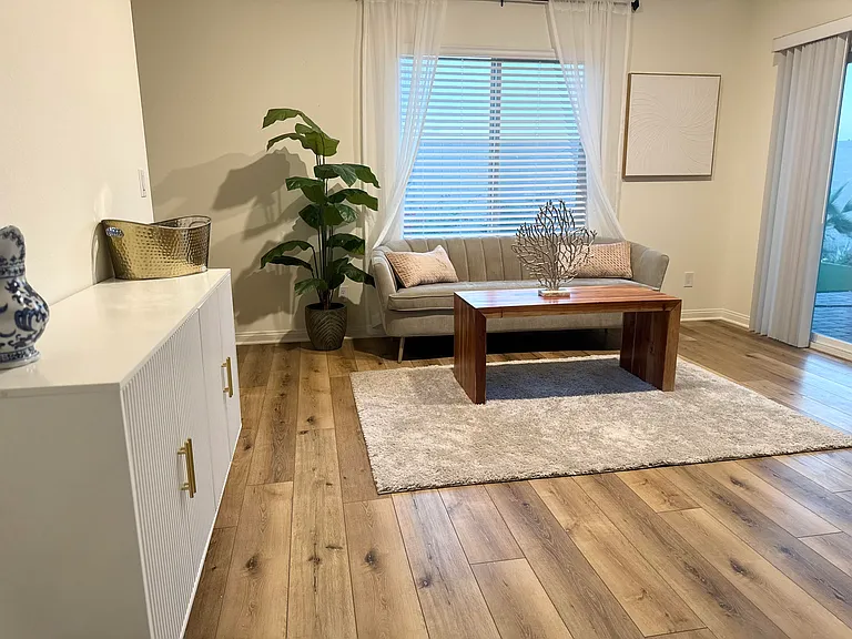 Enjoy this area for reading a book, working or just another conversation area with friends and family. Sideboard includes barware.