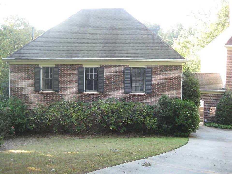 Detached garage with windows of apartment showing