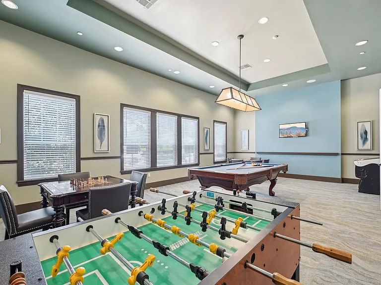 Arcade Game Room with Billiards and Foosball