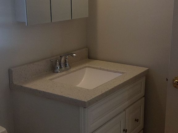 Full bathroom on the 2nd floor. Bathroom was recently upgraded with new vanity, medicine cabinet, lighting and has also been recently painted.