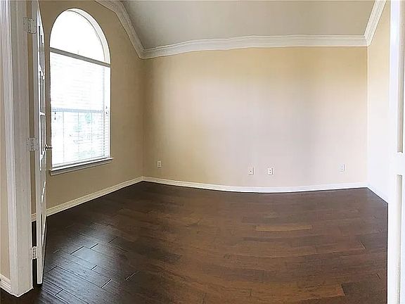 Bedroom 1 overlooking park with French door (could be use for personal office space)