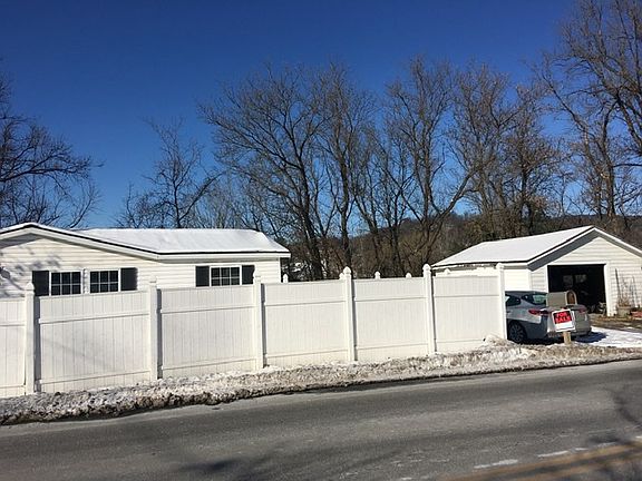 neighbors garage prop. Line