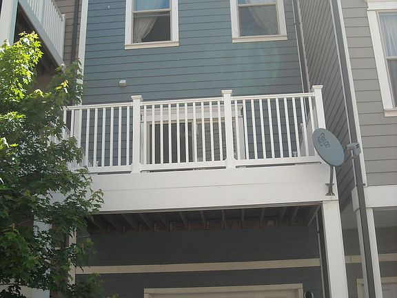 garage with additional parking on driveway