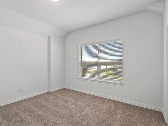 Fourth bedroom. Note Sample product photo - actual exterior and interior selections may vary by hom