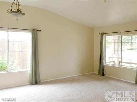 Dining Room and Living Room feature new carpet and paint.