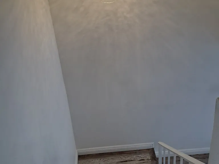 Upgraded chandelier in stairwell