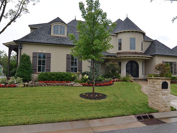 Fantastic home built in the gated Woodmere addition.  Bixby Schools.  2013 Parade of Homes all custom built - not another one like it.  A lot of well thought out spaces with an excellent flowing floor plan.  